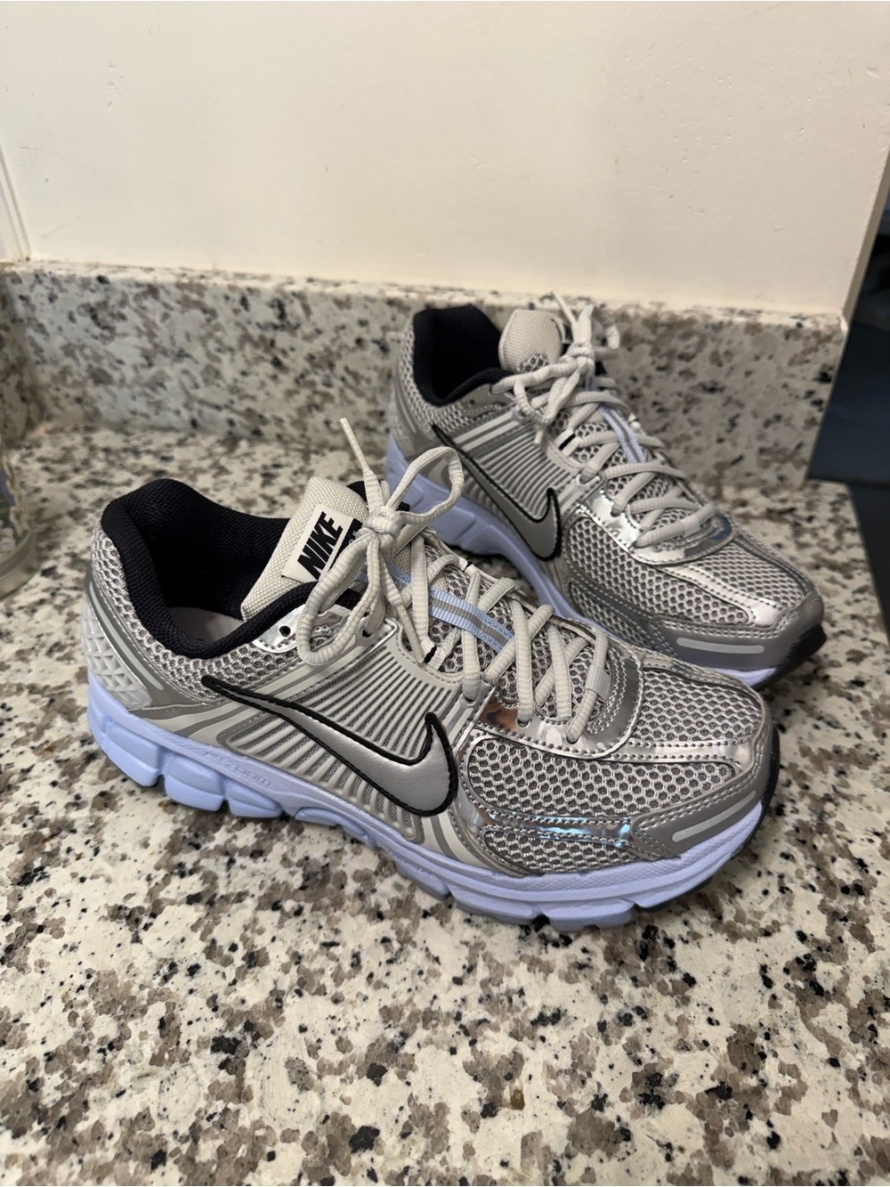 Nike Women’s Silver, Black and blue Vomero 5